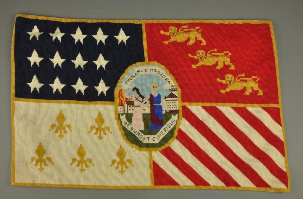 2004.083.001 This needlepoint interpretation of the flag of the city of Detroit was made in 1976, by Helen Coutts, a retired English teacher from Redford High School and a member of the Detroit Historical Society Guild.