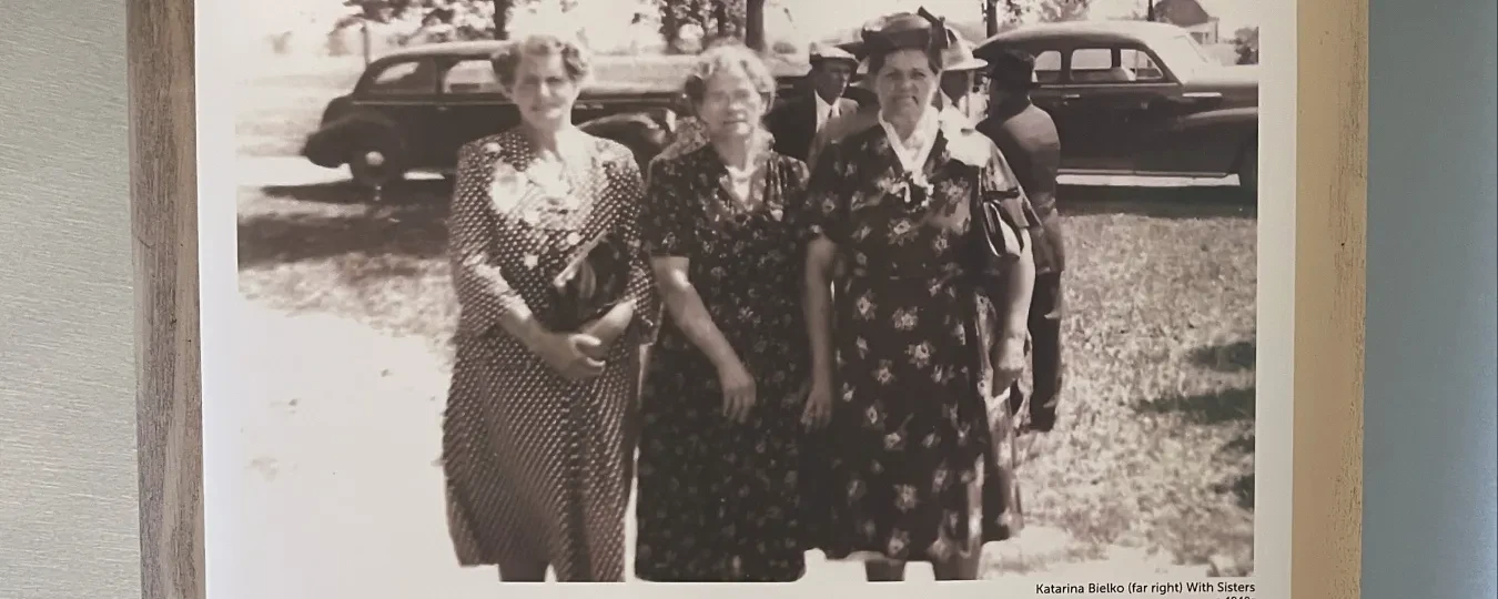 Vintage photo of three women in dresses, standing outdoors; text about Prohibition below.