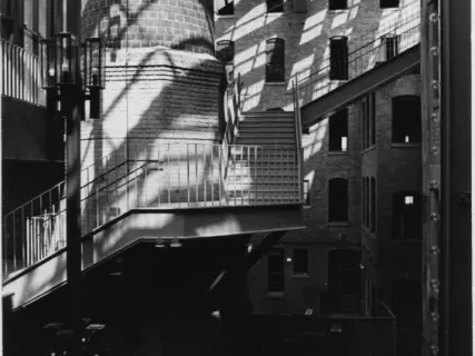 Print, Photographic - Base of 100 year old smoke stack and new connecting stairways