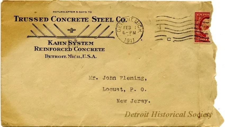 Old envelope addressed to Joan Fleming, postmarked 1919, with a red stamp and company letterhead.